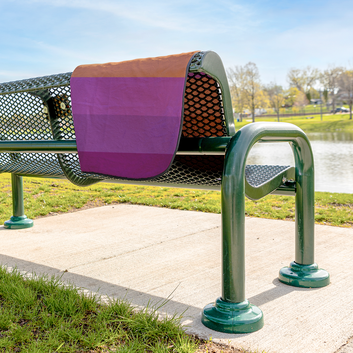 Lesbian_Pride_Stadium_Blanket_StadiumBlanket_Lifestyle_Bench_H_AS_Mockup.png
