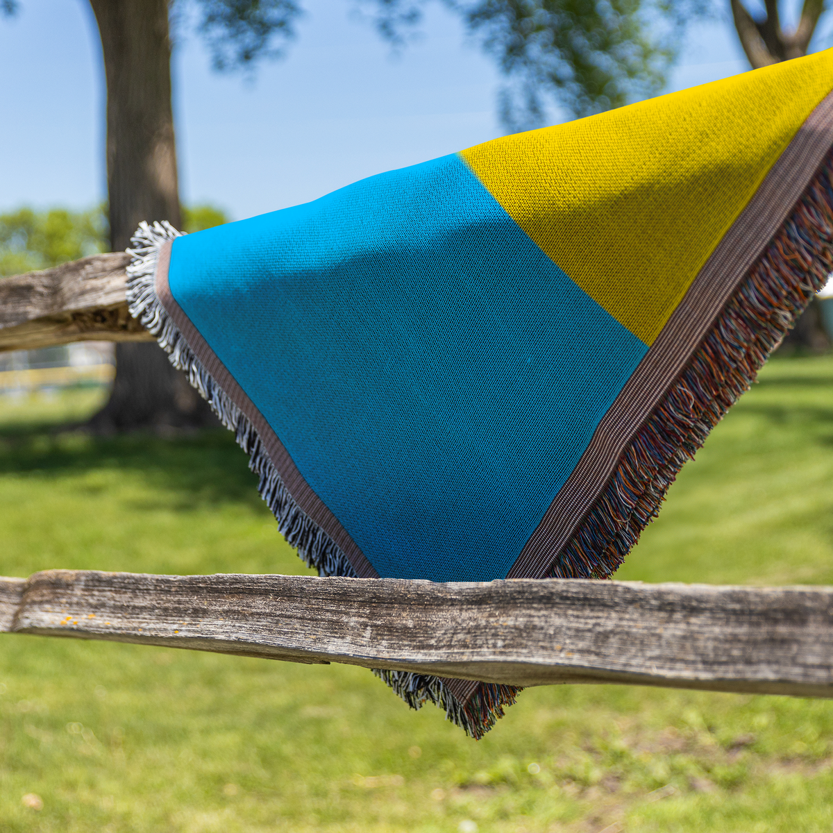 Pan_Pride_Woven_Blanket_Fence_H_Mockup.png