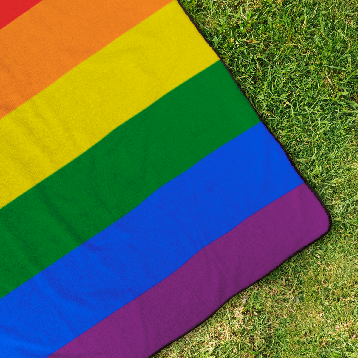 Rainbow_Stadium_Blanket_StadiumBlanket_OverheadGrass_H_Mockup.png