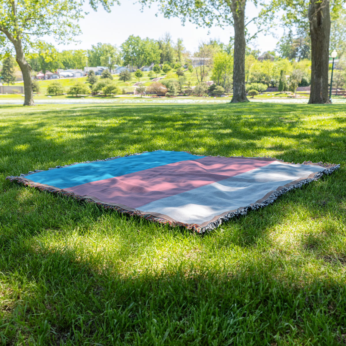 Trans_Pride_Woven_Blanket_Grass_H_Mockup.png